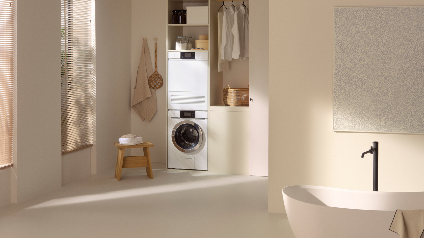 Washing machine and tumble dryer in a stylish, minimalist bathroom