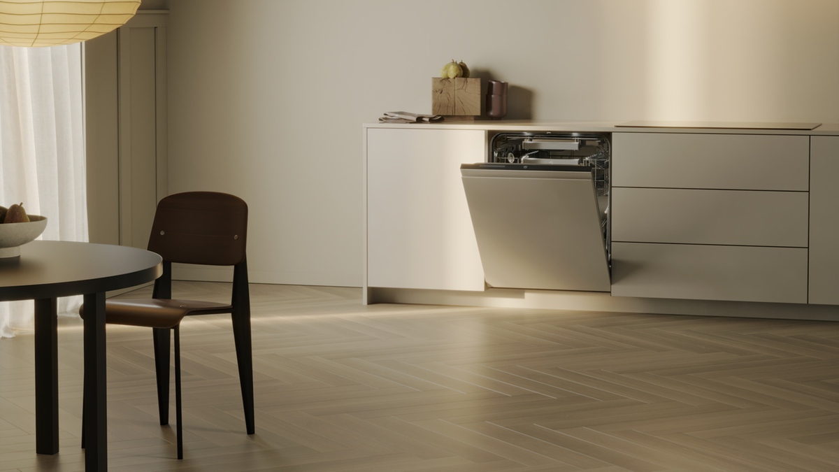 Lavastoviglie moderna in una cucina minimalista con luce calda e design elegante.