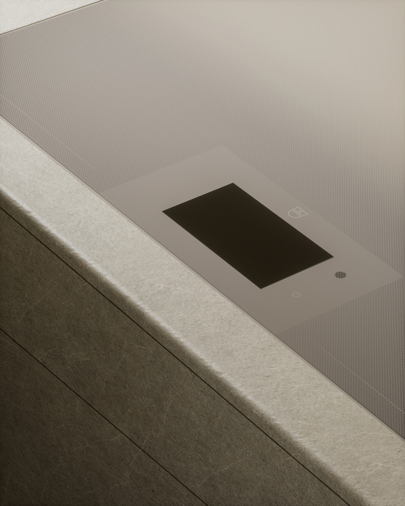 Moderne kogeplade med minimalistisk design i stenoverflade