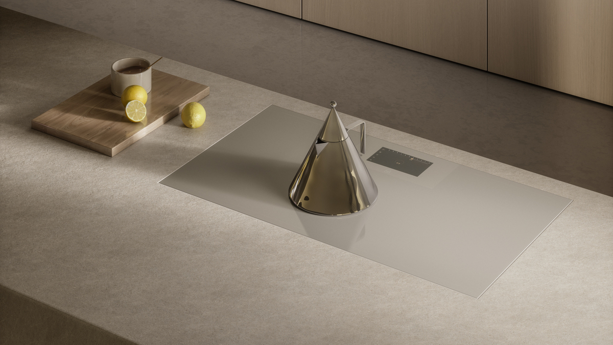 Modern cooktop with minimalist design and a teapot on the worktop