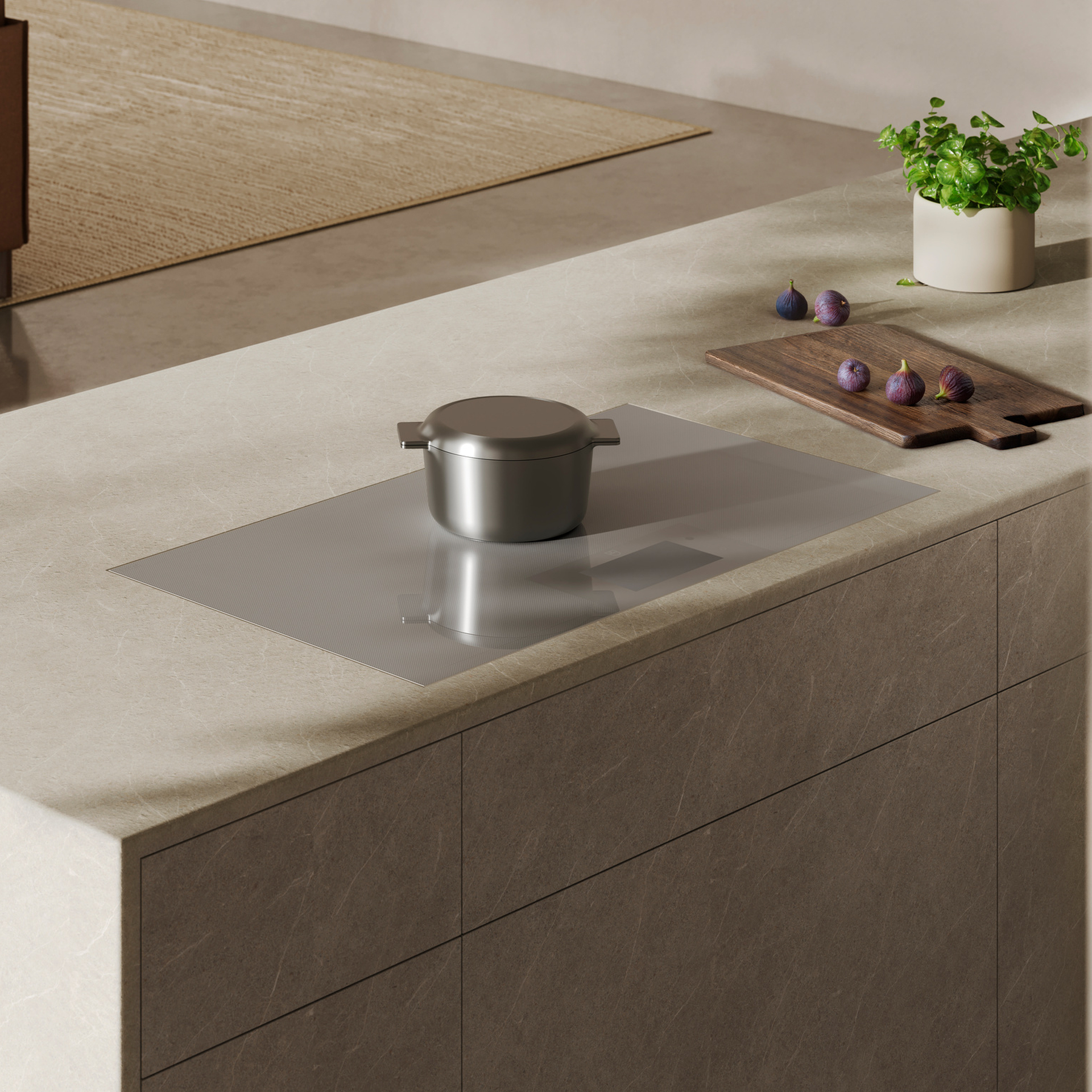 Сучасна варильна поверхня з каструлею та інжиром на кухонній стільниці