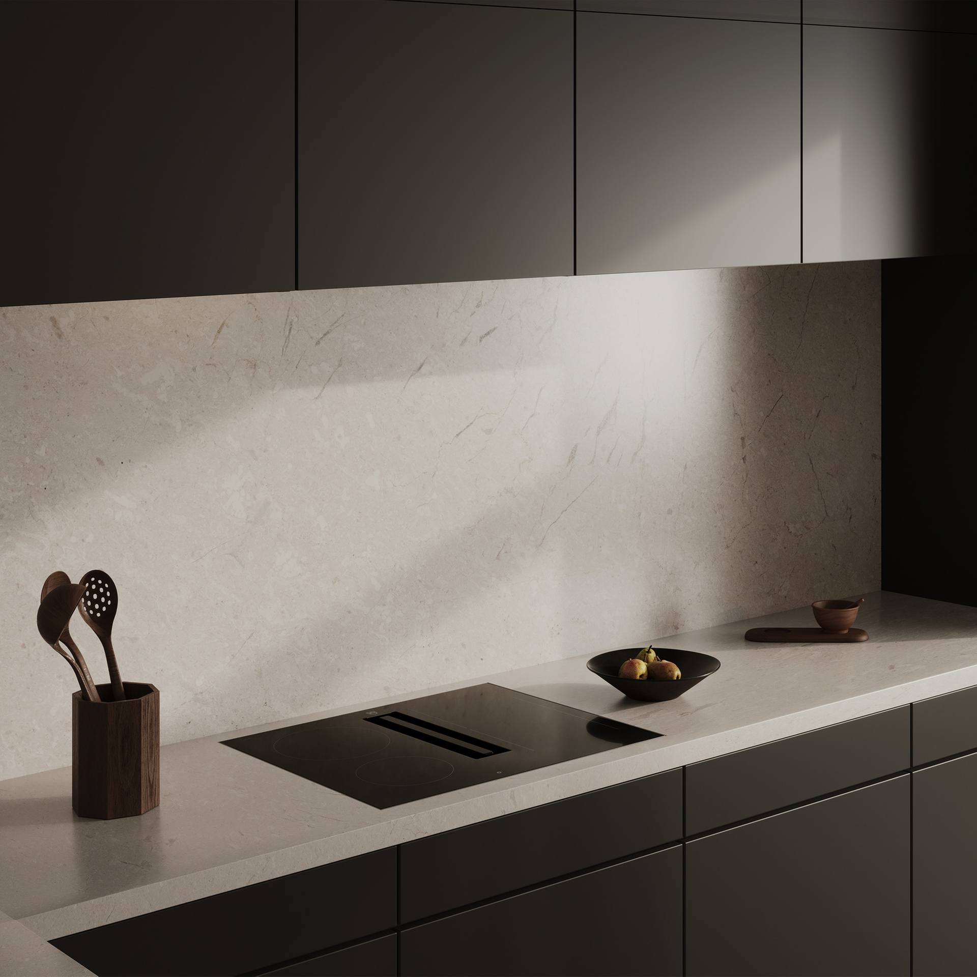 Modern kitchen with dark cabinets and integrated hob