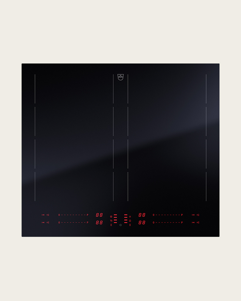 Table de cuisson à induction noire avec une surface élégante et un affichage LED rouge.