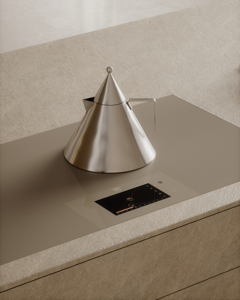 Table de cuisson moderne avec bouilloire en acier inoxydable dans une cuisine élégante.