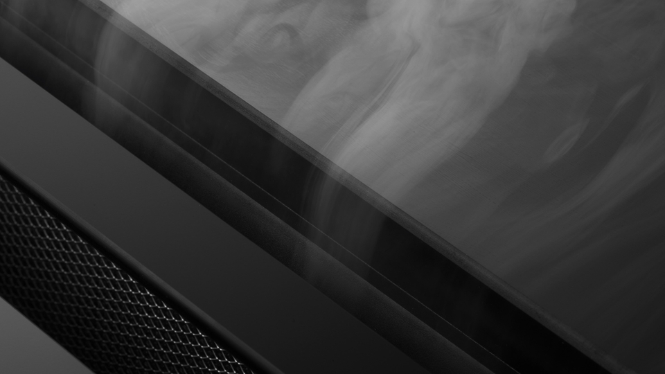 Modern extractor hood with rising steam in an elegant kitchen